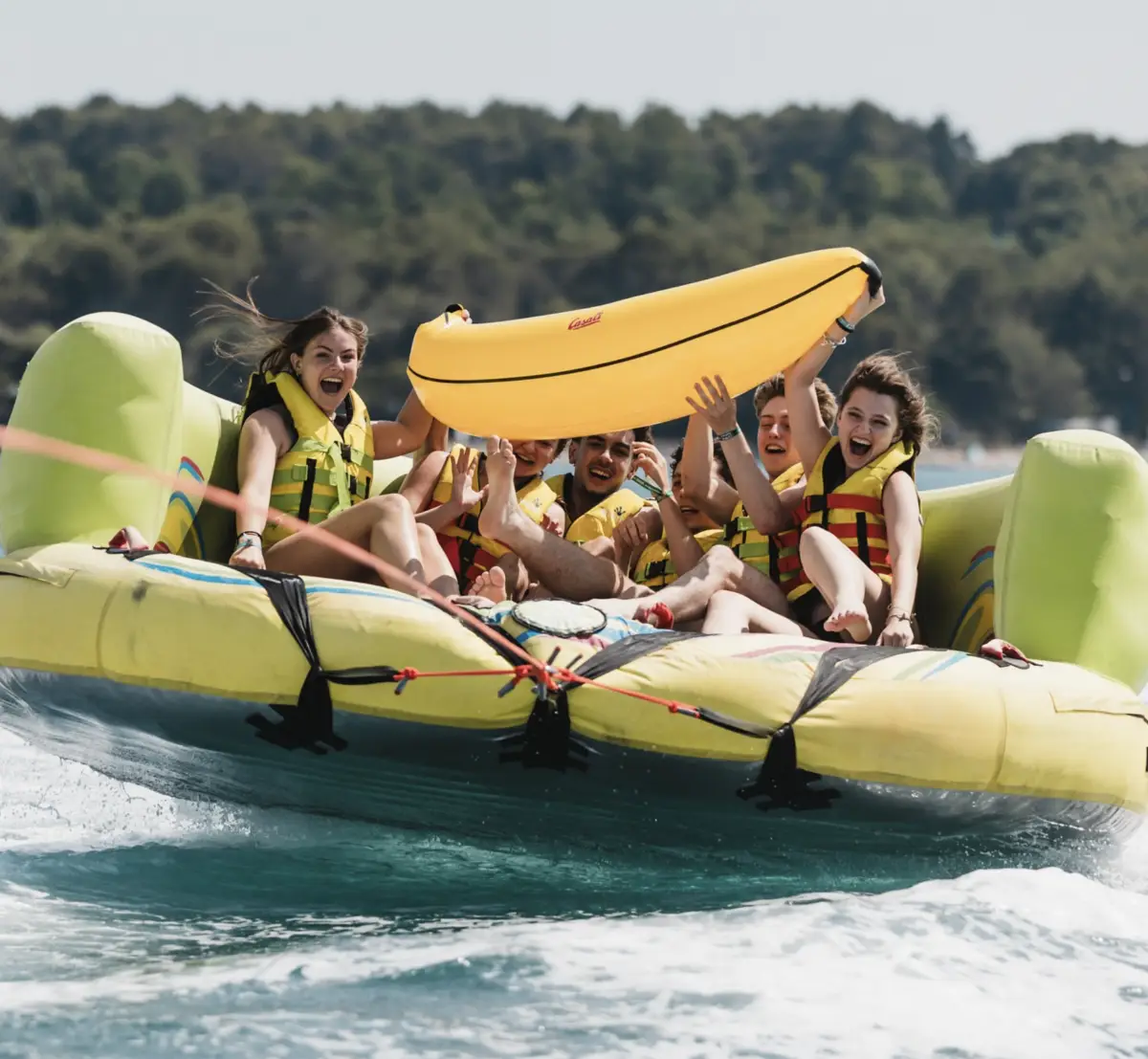 Young people on banana boat